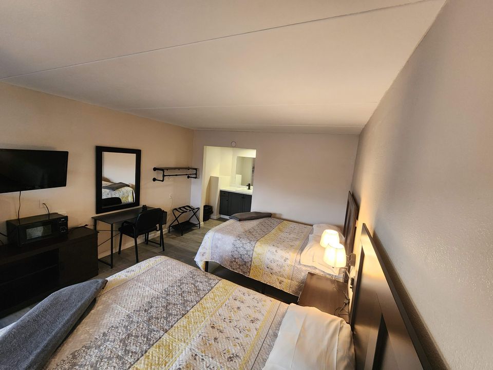 Ground floor room at Stone Face Inn with two full beds