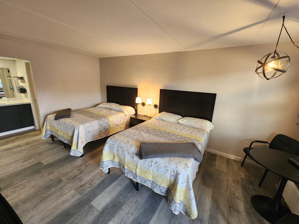 Second floor room at Stone Face Inn with two full beds